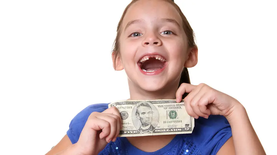 how much does the tooth fairy leave for the first tooth uk