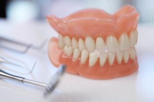 Can You Use a Regular Toothbrush on Dentures